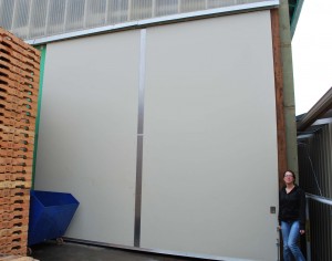 These doors are 10 ft x 16 ft x 2 1/4" thick w/marine-grade plywood exterior.