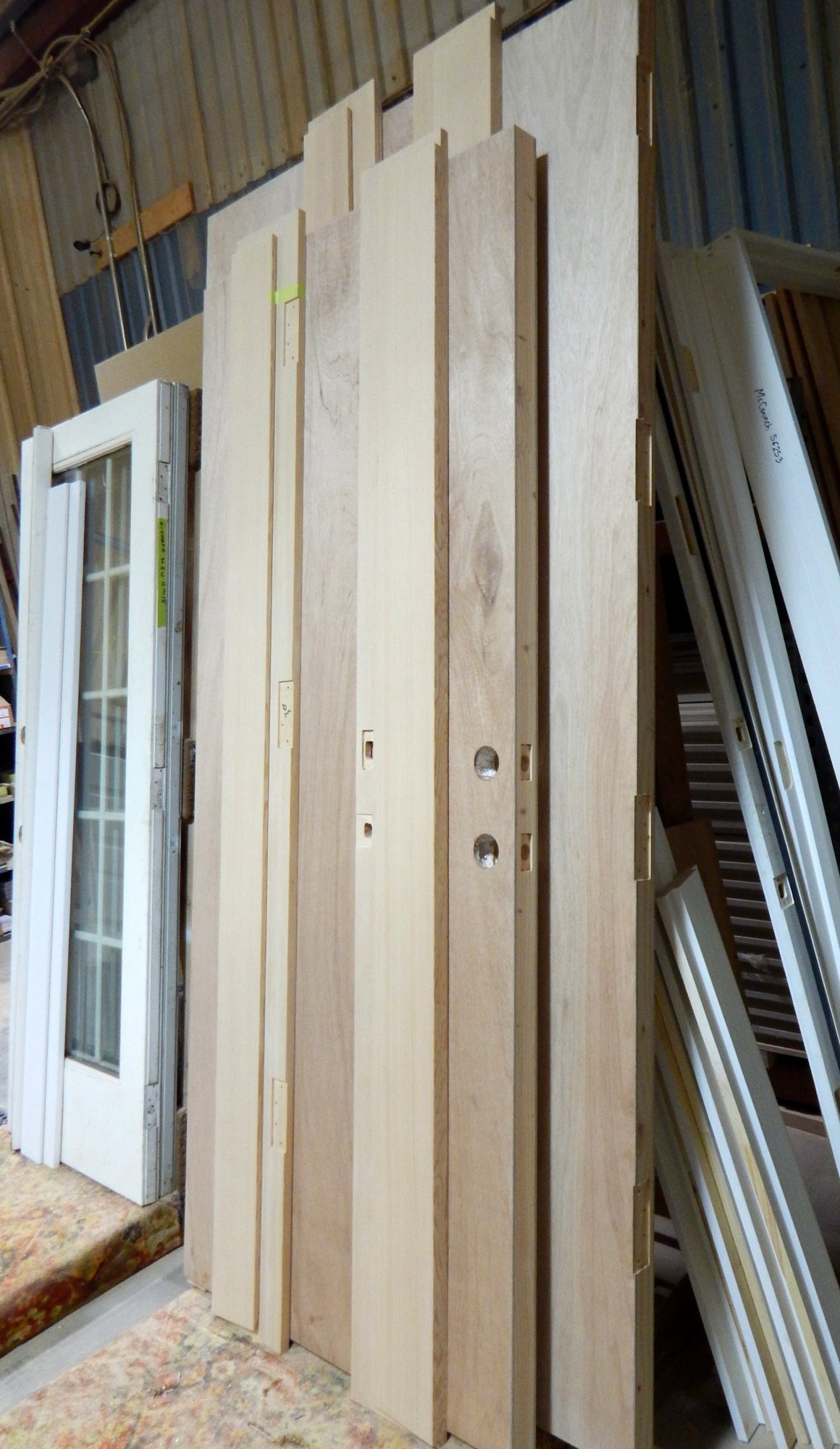 Staging area for Sing door blanks to add hardware pre hang Non