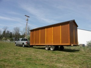Portable shed storage on trailer on truck