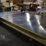 Multiple steel panels can be joined on site to create large stainless steel doors