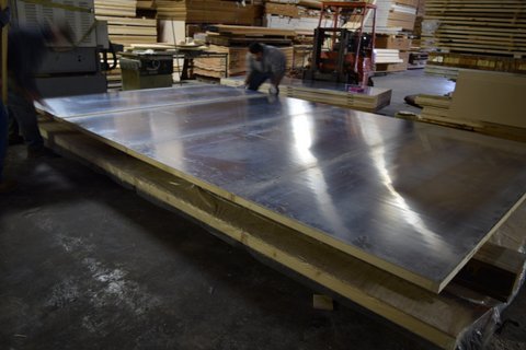 Multiple steel panels can be joined on site to create large stainless steel doors
