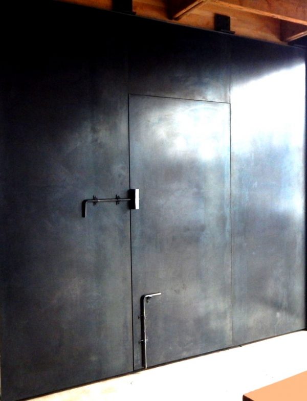 Large hot rolled steel sliding door with man door